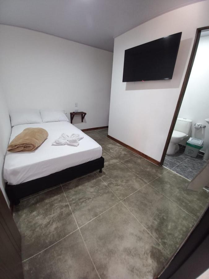 Appartement Artesanos Y Turistas à Guatapé Extérieur photo